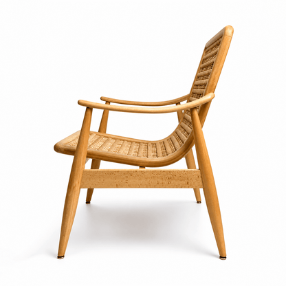 Naseem Arm Chair by Kitzoom featuring a solid beech wood frame with a handcrafted wooden bead seat and backrest, inspired by traditional Arabesque patterns.