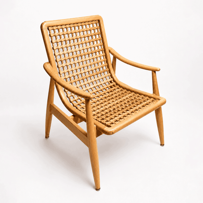 Naseem Arm Chair by Kitzoom featuring a solid beech wood frame with a handcrafted wooden bead seat and backrest, inspired by traditional Arabesque patterns.
