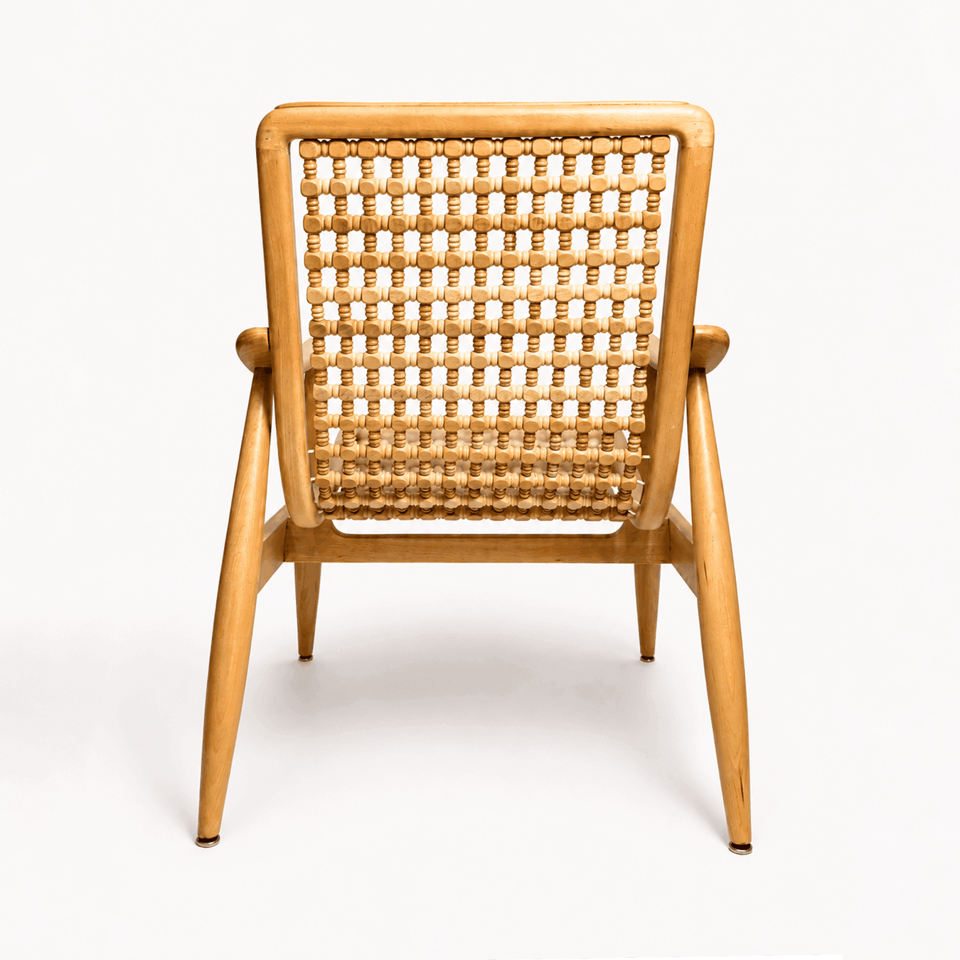 Naseem Arm Chair by Kitzoom featuring a solid beech wood frame with a handcrafted wooden bead seat and backrest, inspired by traditional Arabesque patterns.